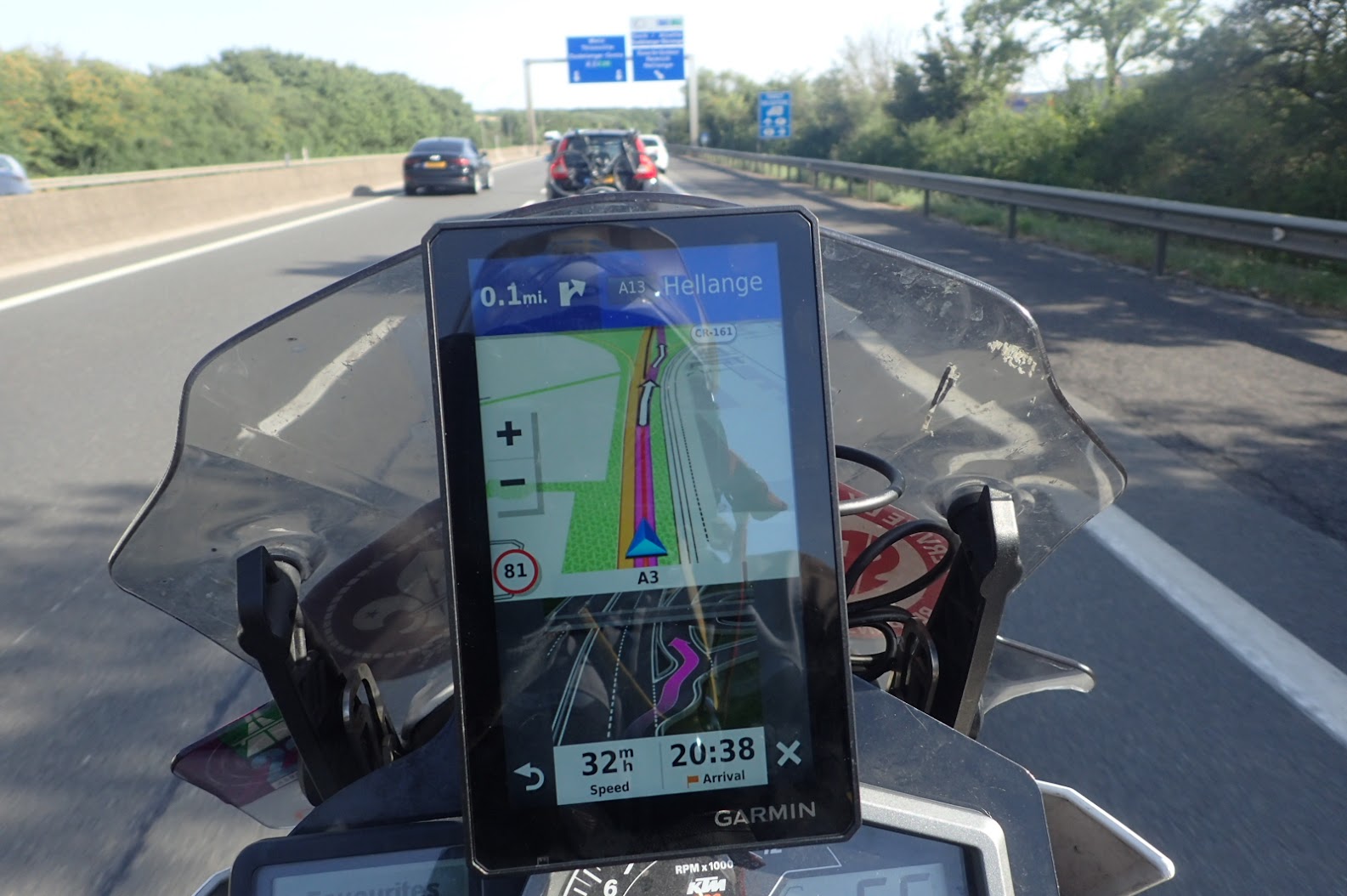 A view from the seat of a motorbike with a Garmin Zumo XT navigating a turning